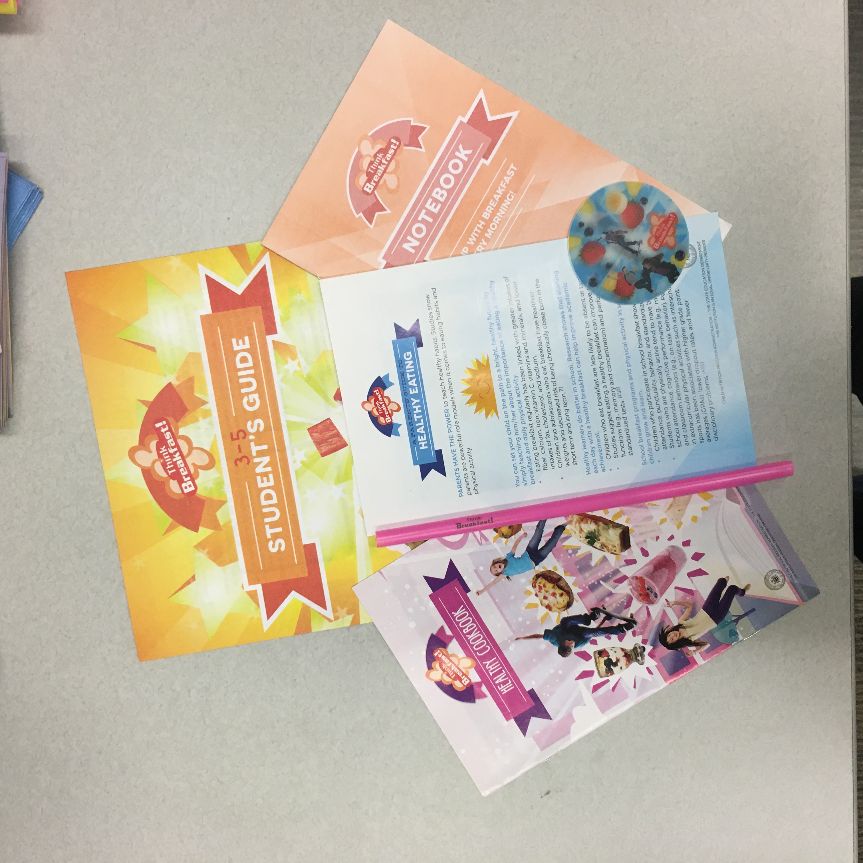 Think Breakfast Kits suitable for Grades 3-5. There is a 3-5 student's guide, a guide to healthy eating, a healthy cookbook, a notebook, a sticker and a straw.